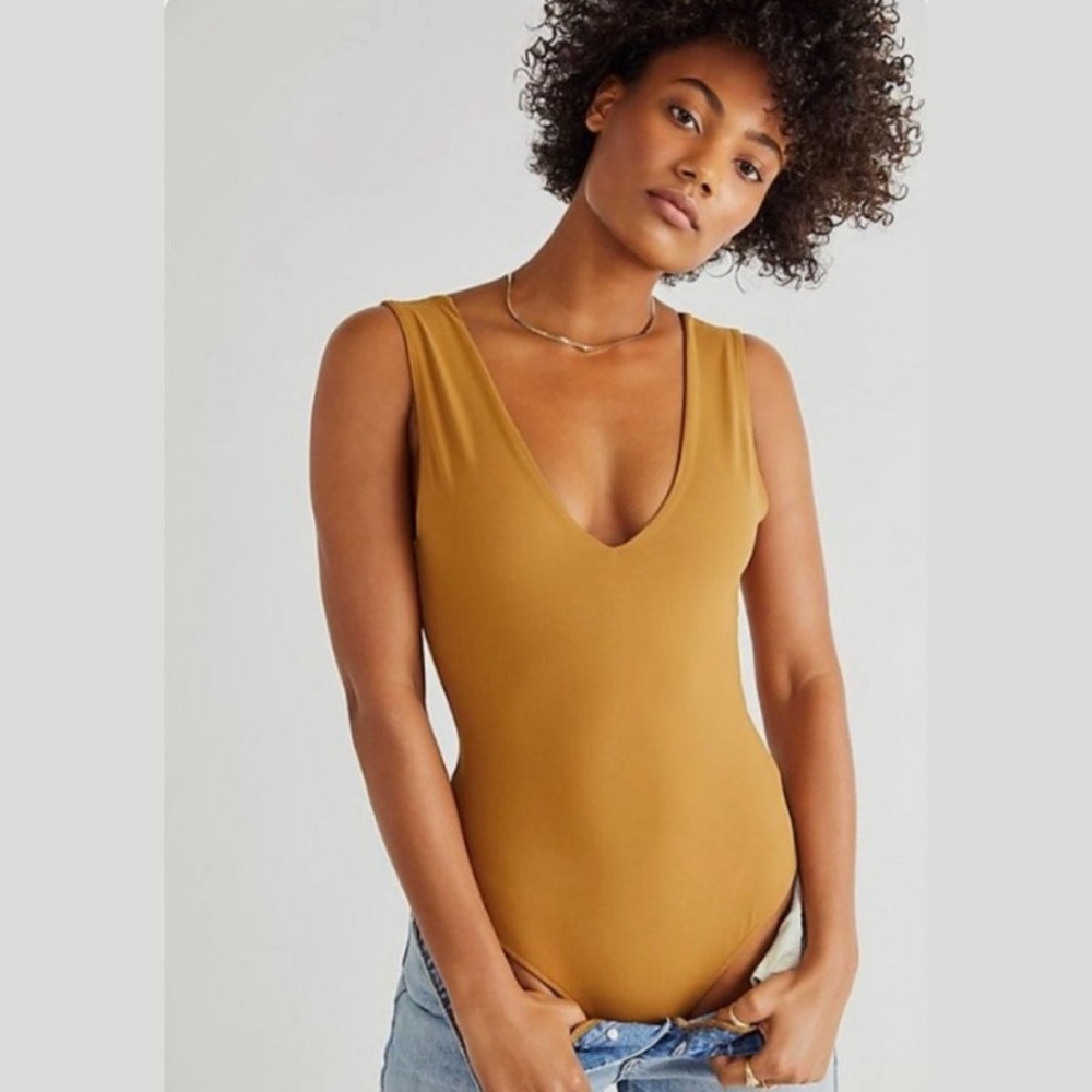 Free People off white bodysuit medium